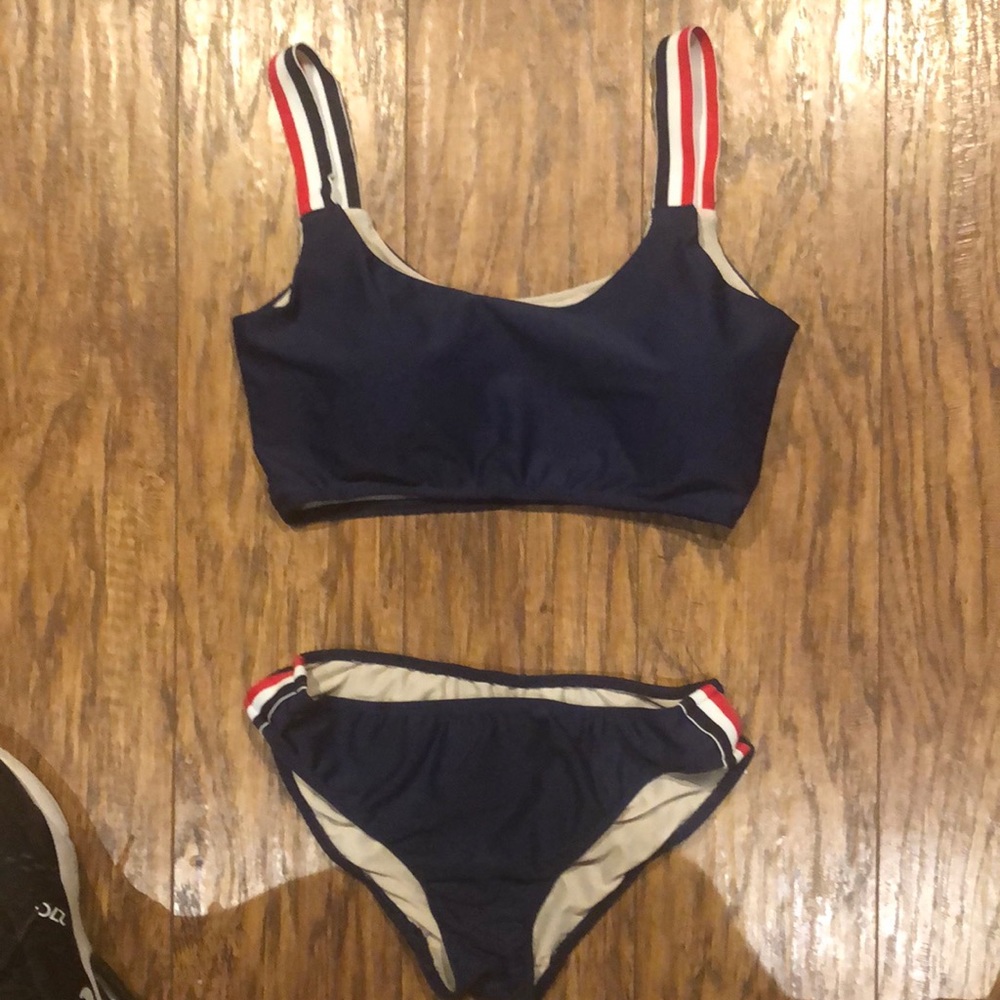 Girls size small navy blue two piece swimsuit.
